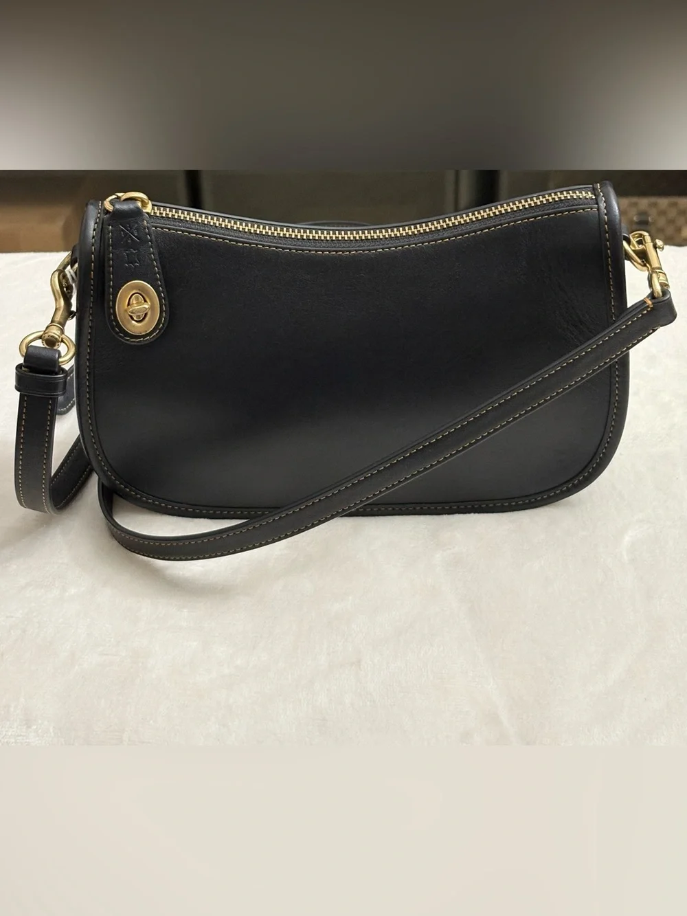 Coach Black Swinger Glove-Tanned Leather Crossbody Bag.